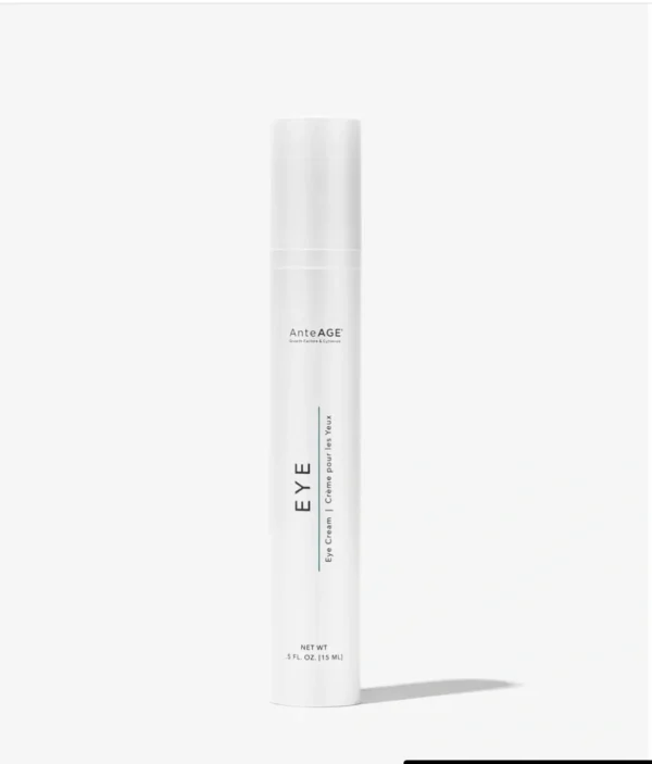 A white tube of eye cream sitting on top of a table.