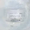 A close up of the epicutis logo on some kind of cream