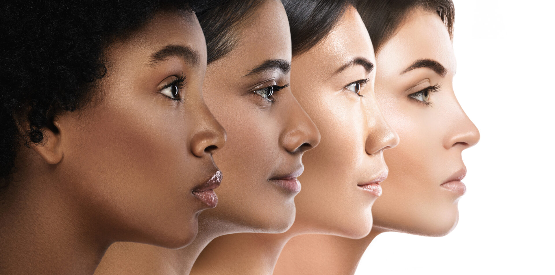 A series of women 's faces showing different skin tones.